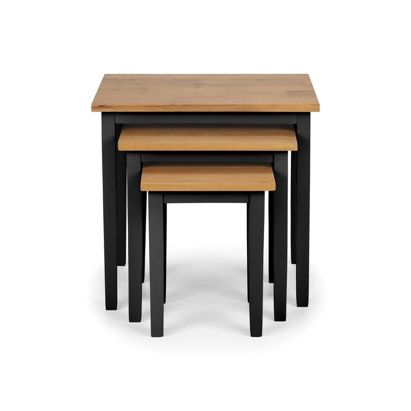 Set of three nesting tables with wooden tops and black legs on a white background