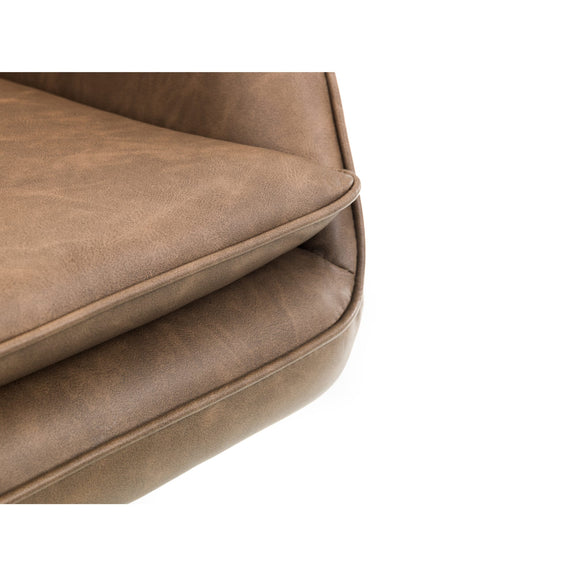 Close-up of a brown leather seat cushion on a white background