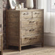 Wooden dresser with four drawers in a room setting.