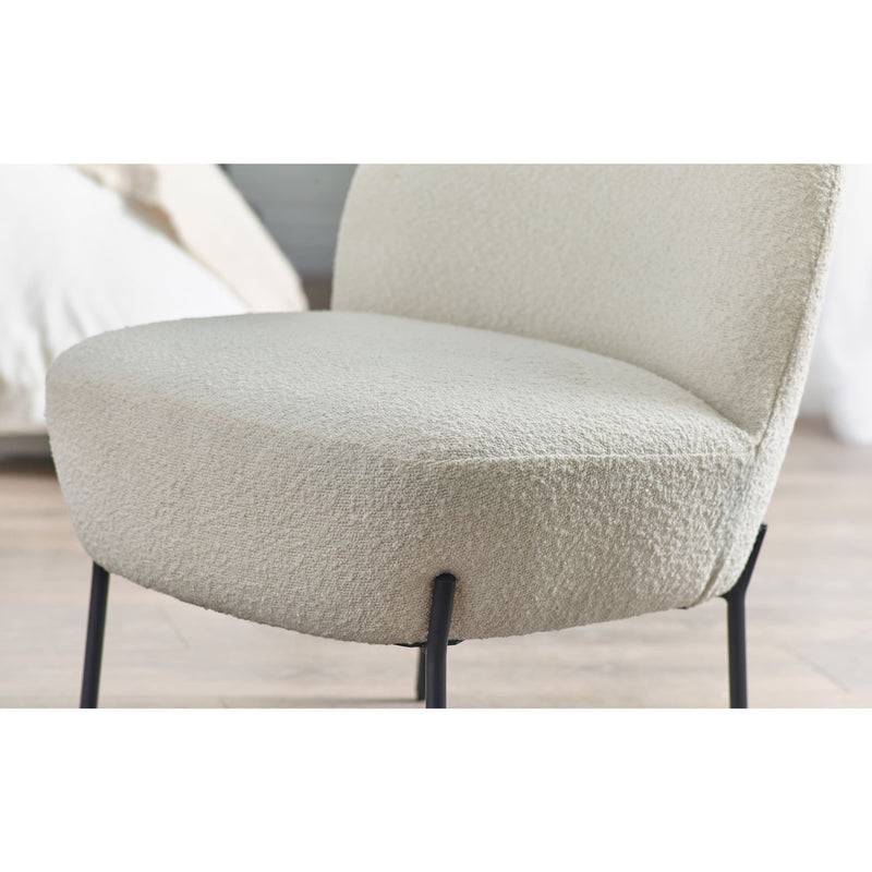 Close-up of a textured chair seat with a blurred background