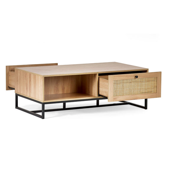Wooden coffee table with open shelf and wicker side panel on a white background