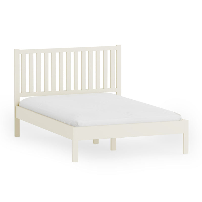 White wooden bed frame with a mattress on a white background