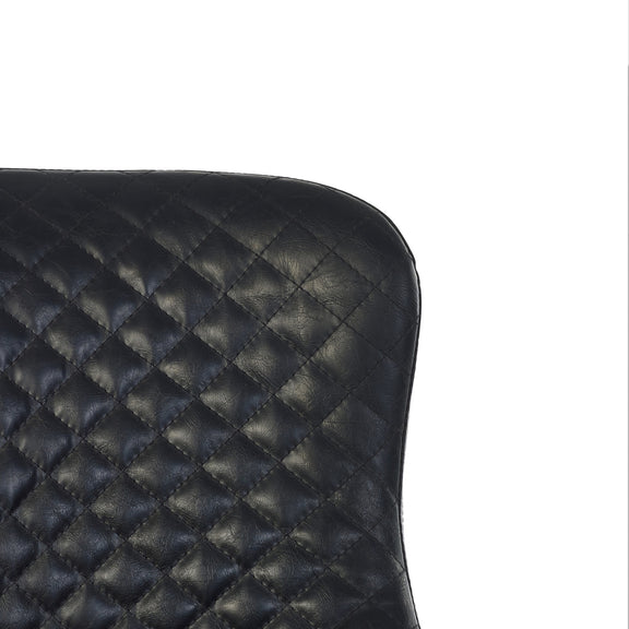 Black quilted leather seat cover on a white background
