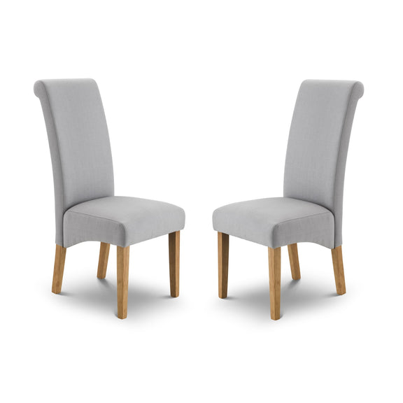 Two gray upholstered chairs with wooden legs on a white background