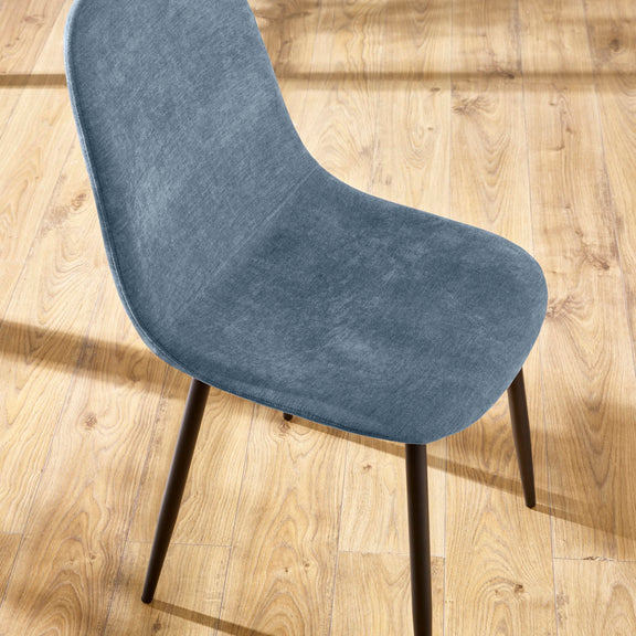 Blue chair on a wooden floor