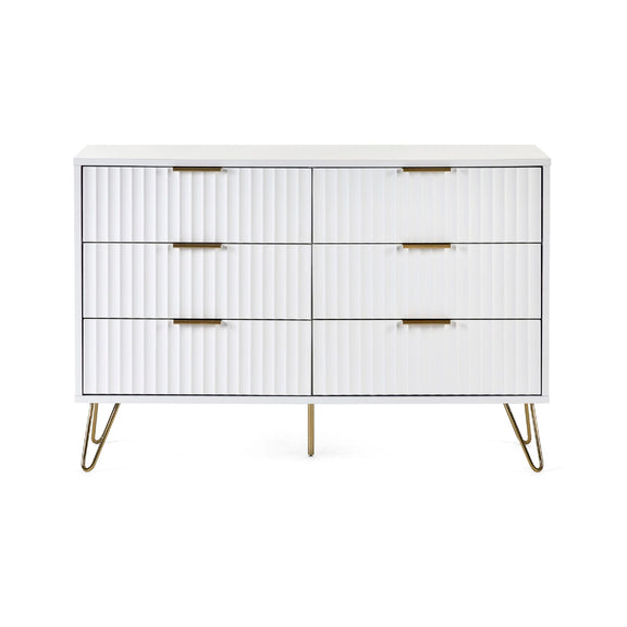 White dresser with gold accents on a white background