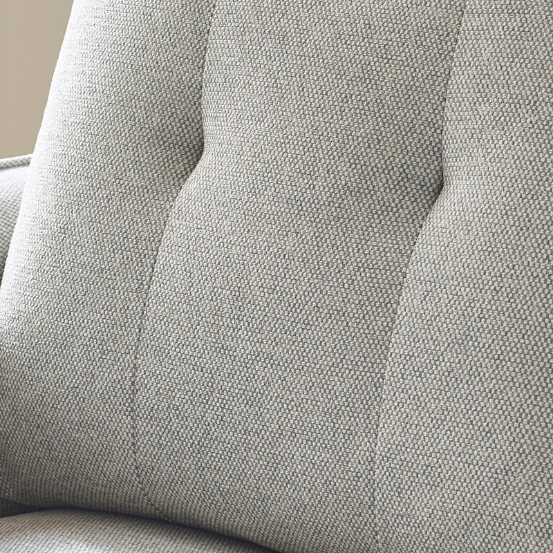 Close-up of a textured gray fabric surface