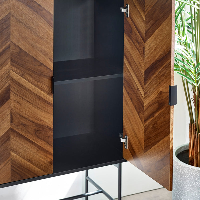 Wooden cabinet with glass doors in a modern interior setting