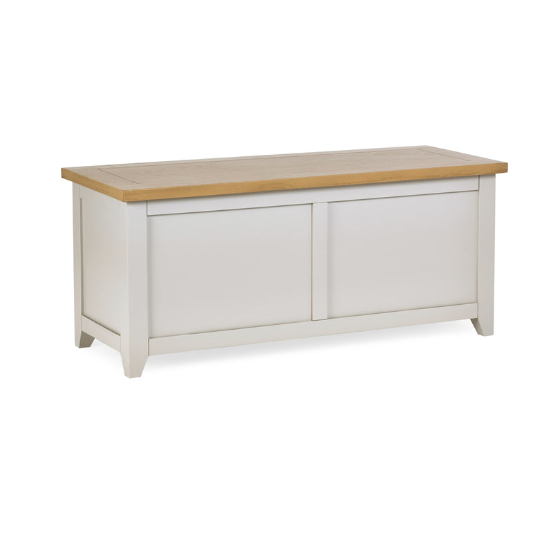 White storage bench with a wooden top on a white background