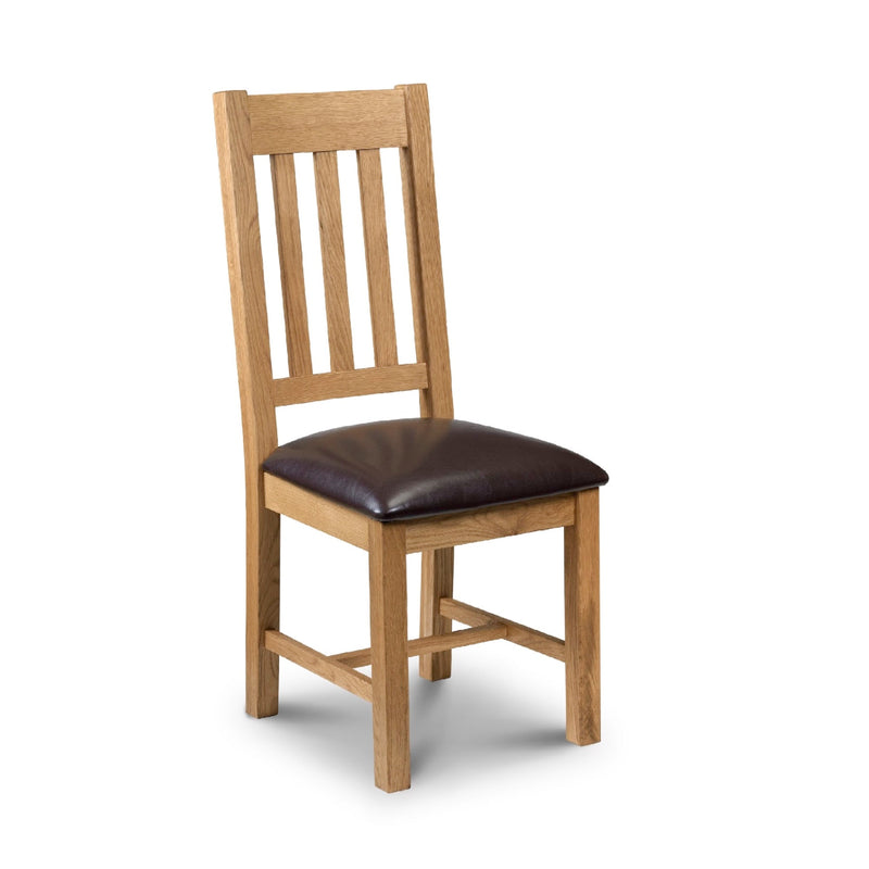 Wooden chair with a brown leather seat on a white background