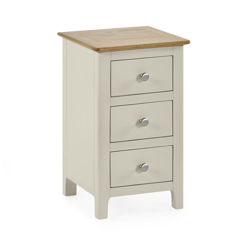 White bedside table with oak top and three storage drawers front view