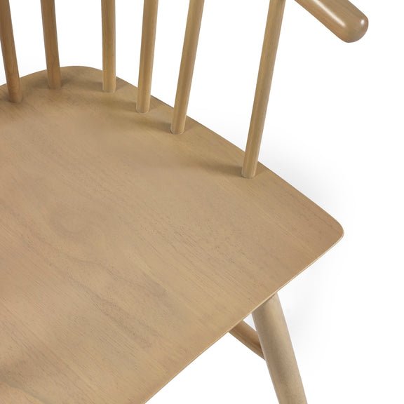 Close-up of a wooden chair with a white background