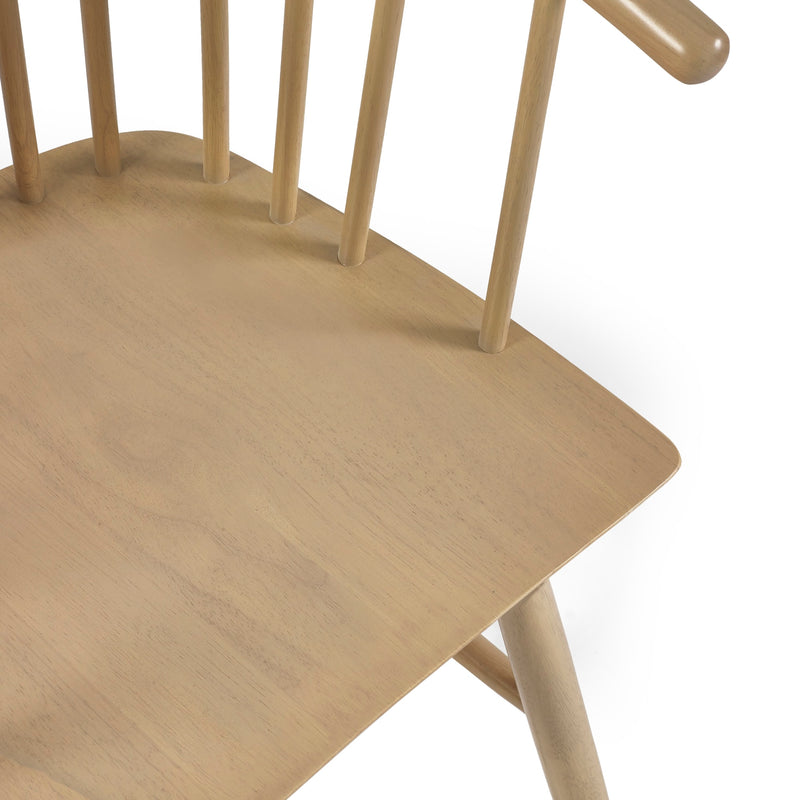 Close-up of a wooden chair with a white background