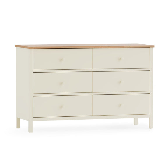 White dresser with wooden top on a white background