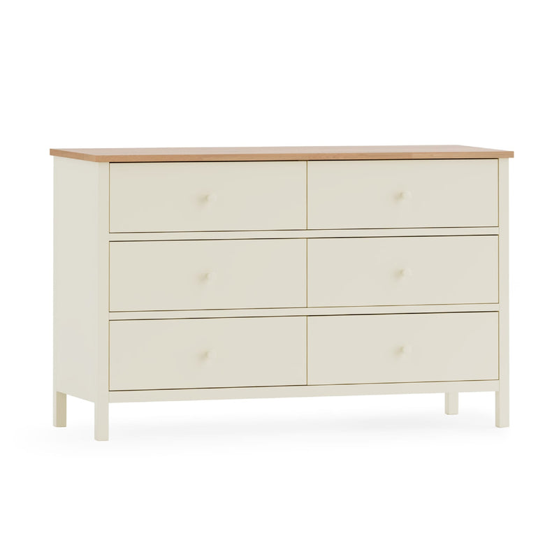 White dresser with wooden top on a white background