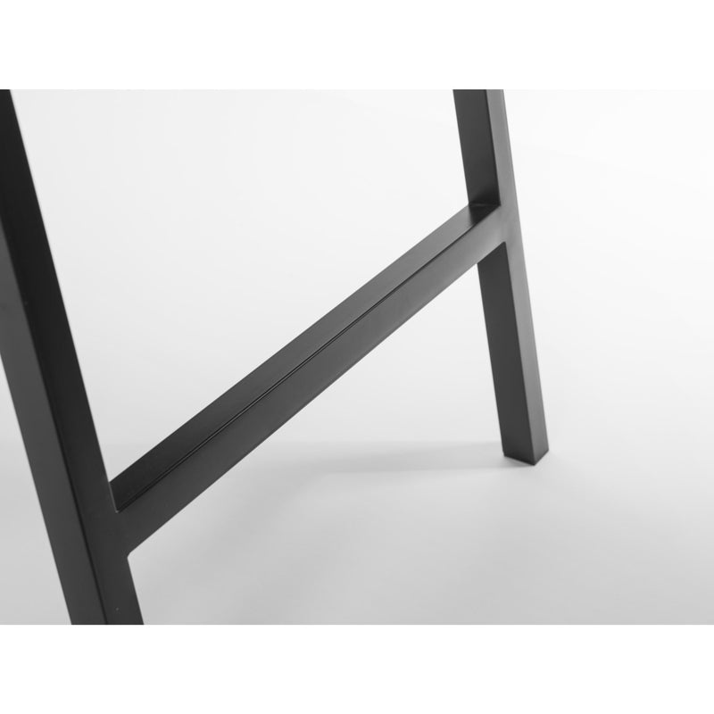 Black metal chair frame on a white background
