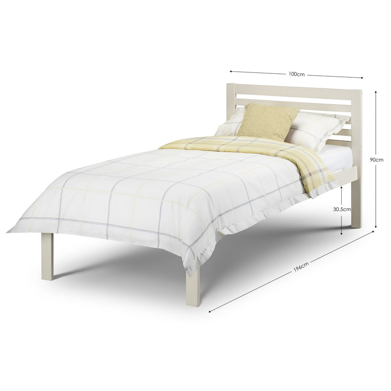 White bed with measurements on a white background