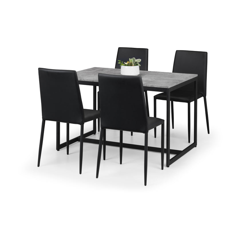 Dining table set with four black chairs on a white background