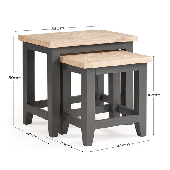 Two nesting tables with dimensions labeled on a white background