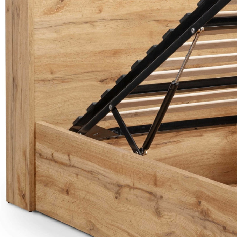 Wooden bed frame with black metal support structure