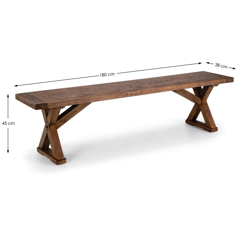 Wooden dining table with X-shaped legs on a white background