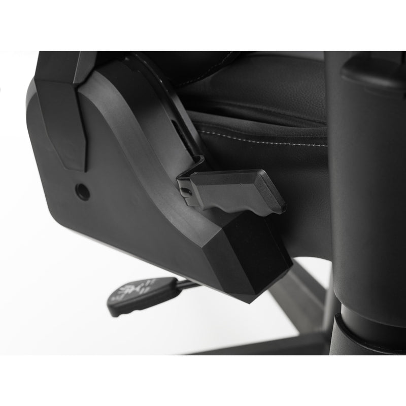 Close-up of a car seat with a black seat cover and armrest.