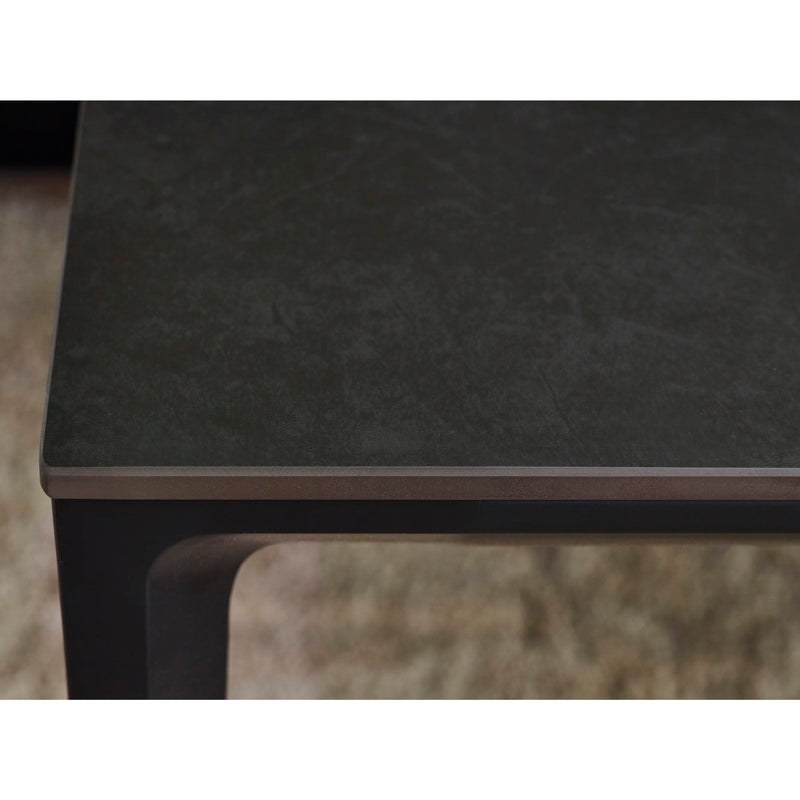 Dark stone countertop with a blurred background