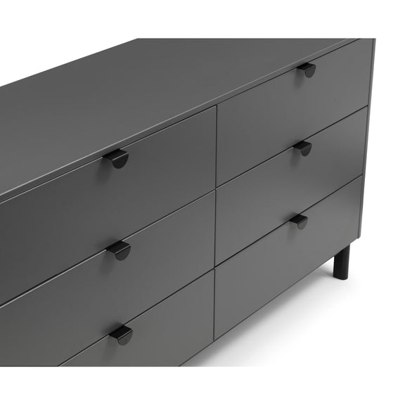 Gray dresser with six drawers on a white background