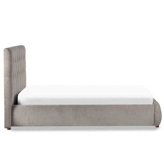 Gray upholstered bed with white mattress on a white background
