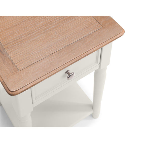 Wooden side table with a white base on a white background