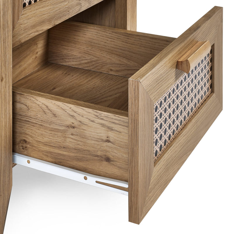 Close-up of open drawer showing oak wood interior and rattan front