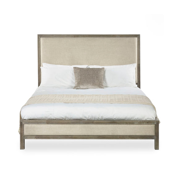 Bed with beige upholstered headboard and white bedding on a white background