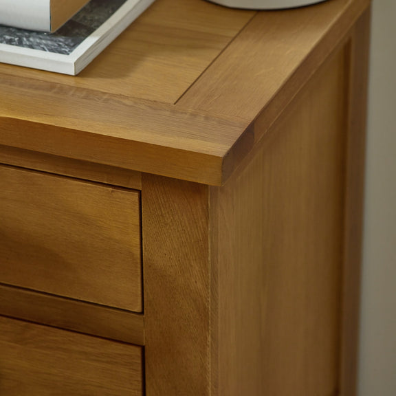 Close-up of a wooden cabinet with a drawer