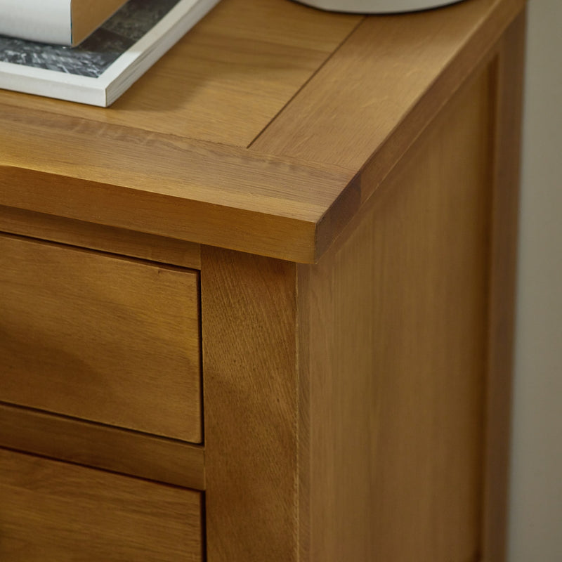 Close-up of a wooden cabinet with a drawer