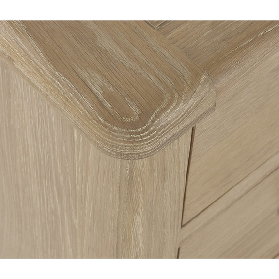 Close-up of a wooden surface with a chevron pattern