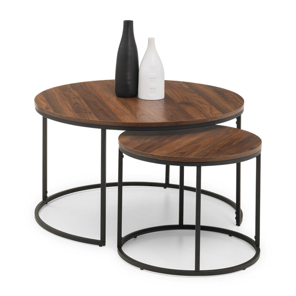 Set of two wooden side tables with black metal legs on a white background