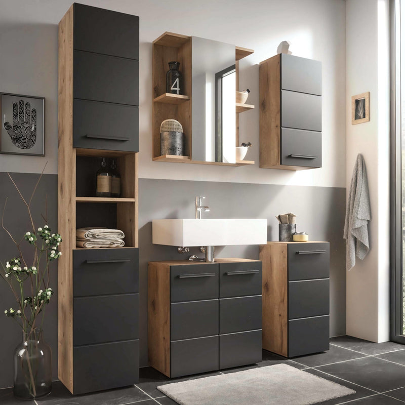 Bathroom interior with wooden and gray cabinets, sink, and mirror.