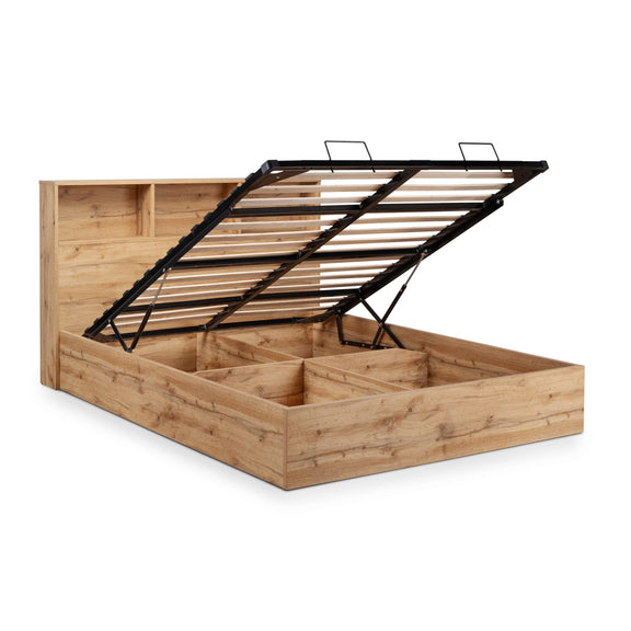 Wooden bed frame with black metal storage drawers on a white background