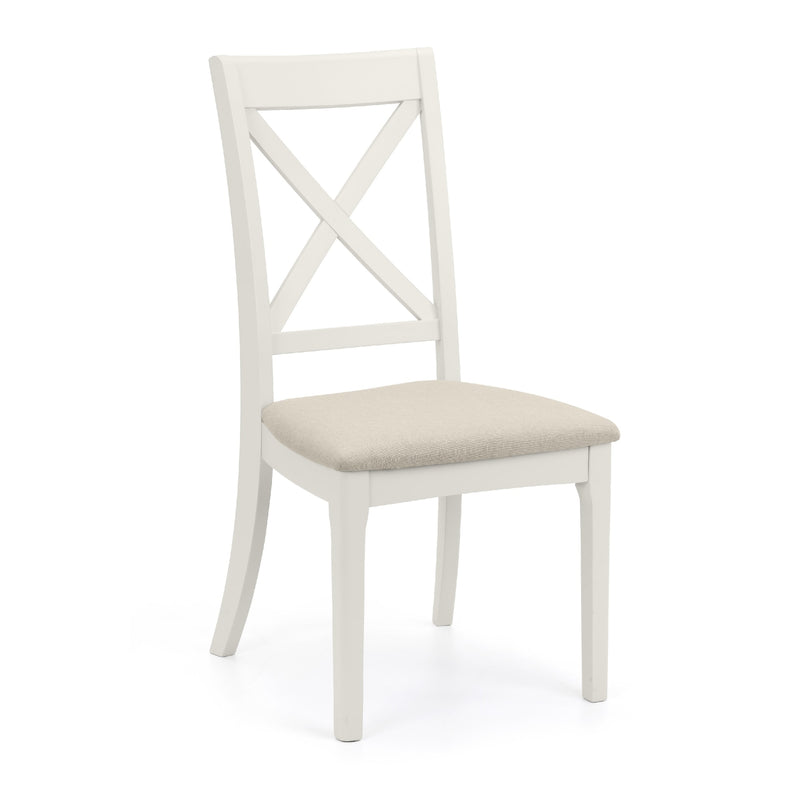 White wooden chair with a beige cushion on a white background