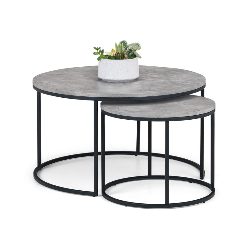Set of two round coffee tables with gray marble tops and black metal frames on a white background.