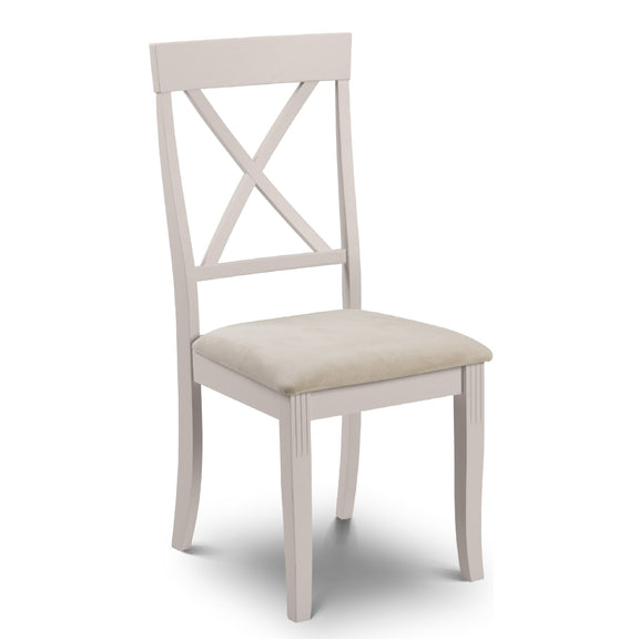 White chair with a beige cushion on a white background