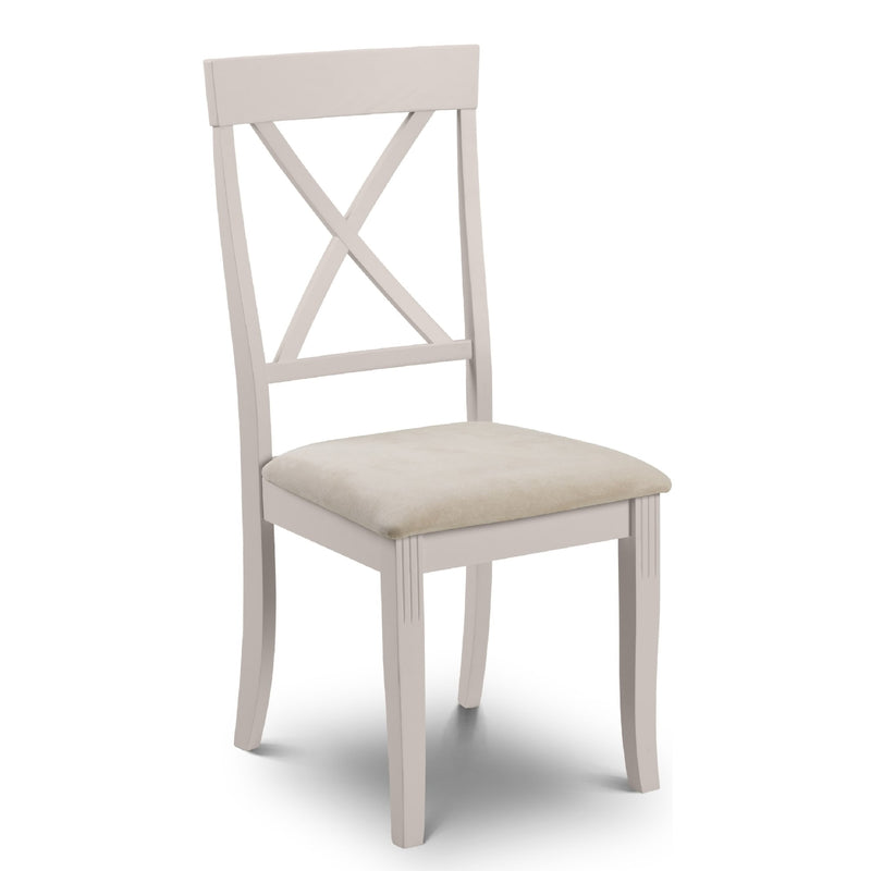 White chair with a beige cushion on a white background