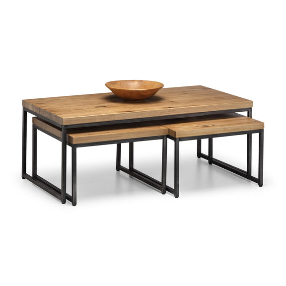 Wooden coffee table with metal legs on a white background