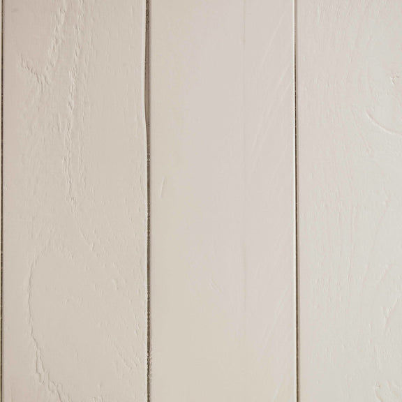 Close-up of a textured beige wall panel