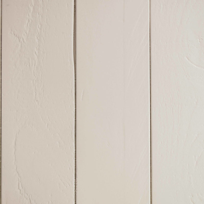 Close-up of a textured beige wall panel