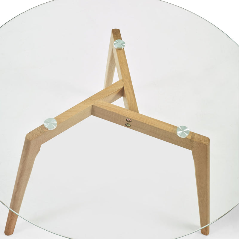 Glass table with wooden legs on a white background