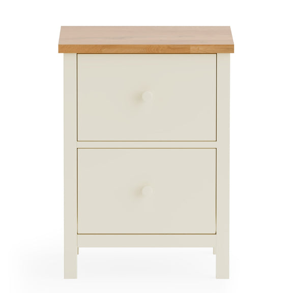 White cabinet with a wooden top on a white background