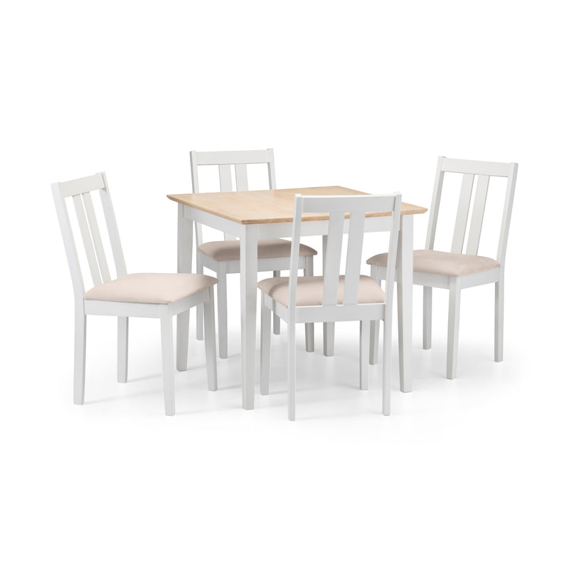 Dining table set with four white chairs on a white background