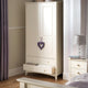 White wardrobe with open drawer in a bedroom setting