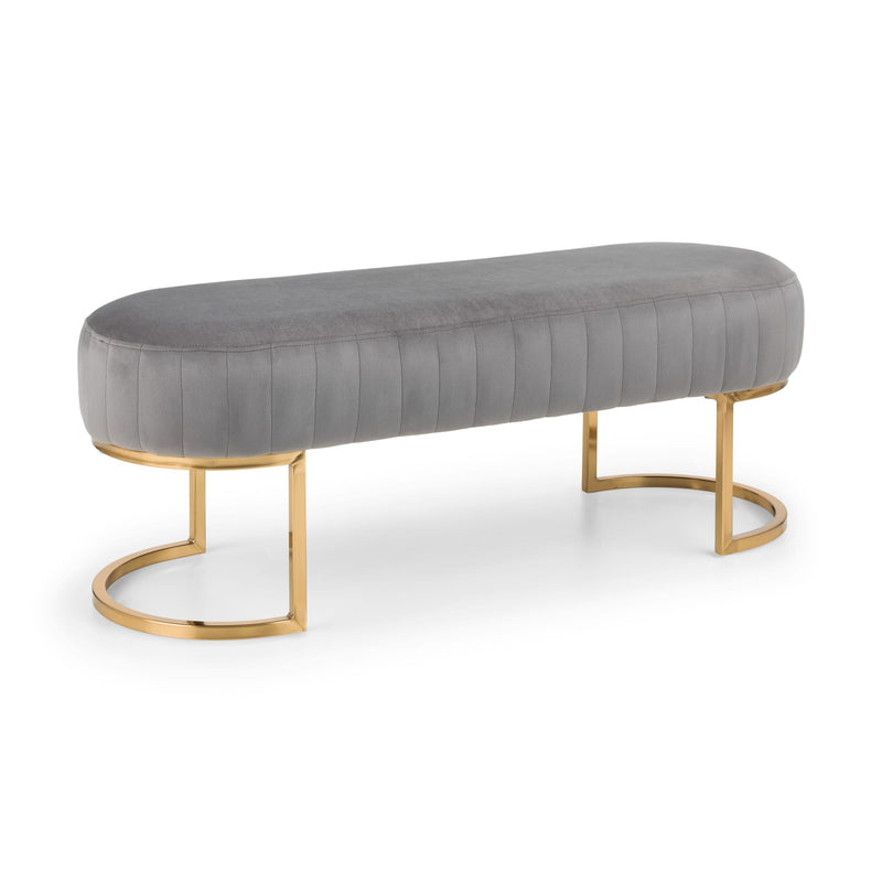 Gray upholstered bench with gold metal legs on a white background